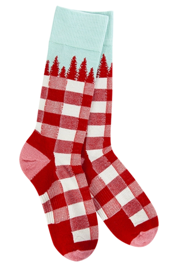 A pair of crew-length socks featuring a red and white gingham pattern on the foot and lower leg, transitioning to a light blue cuff with a silhouette of red pine trees along the top edge, resembling a forest or mountain range.