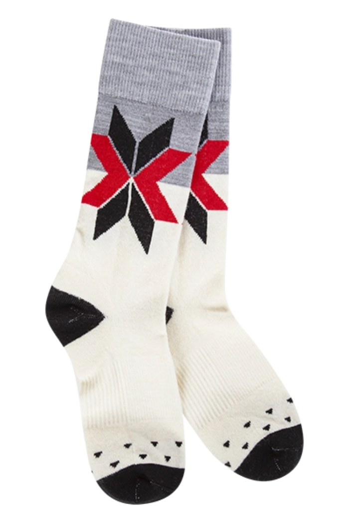 Socks featuring a white base with a grey cuff and heel, and a prominent red and black fair isle star pattern on the leg, with smaller black triangular patterns on the toes.