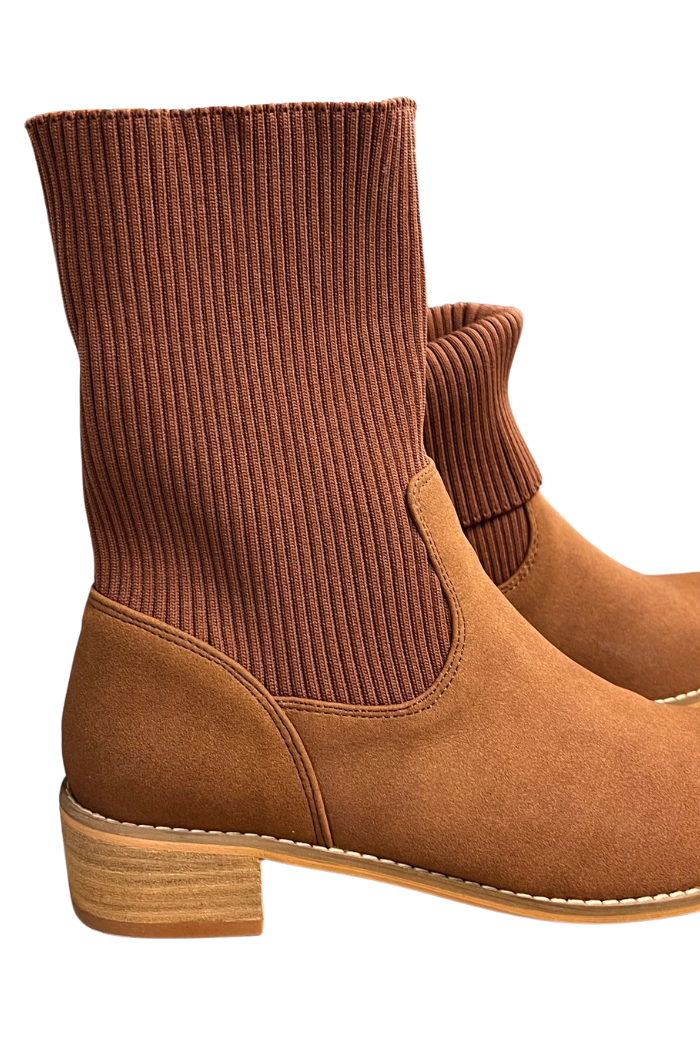 Folded Knit Ankle Booties with ribbed knit sock-style uppers, suede-like lower section, low wooden heel, ribbed cuff, and visible sole stitching.