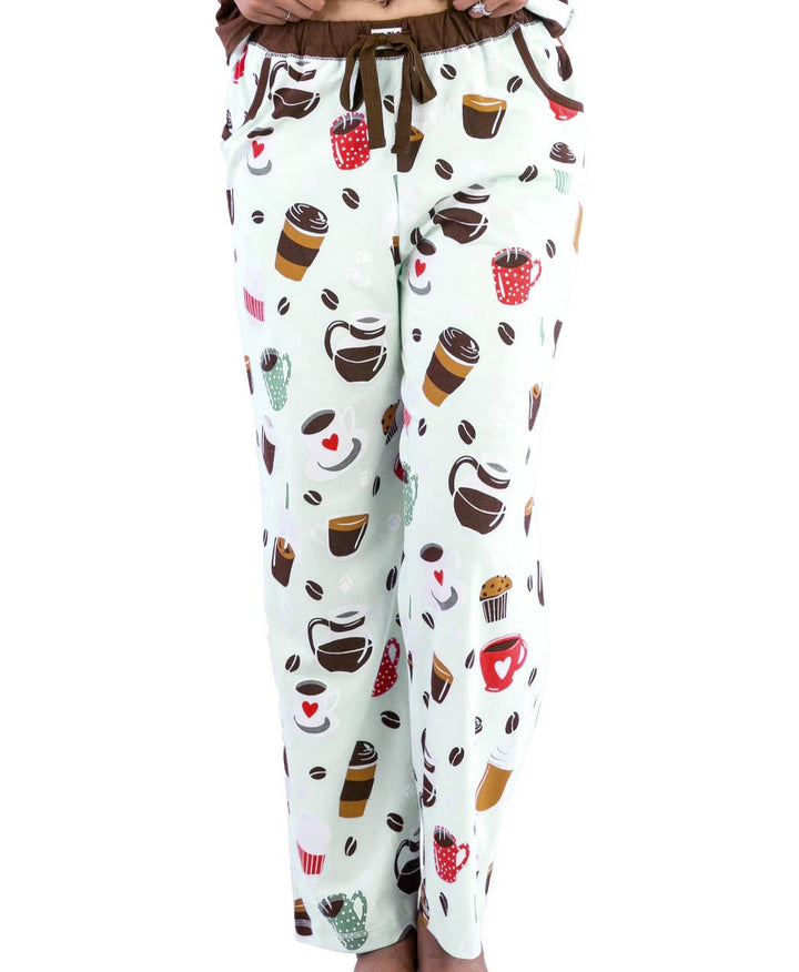 Wearing Dog Mom, Cat Nap & More Pajama Pants—light-colored cotton lounge pants with coffee cups, mugs, cupcakes, and coffee bean prints. Features a brown waist drawstring for comfort.