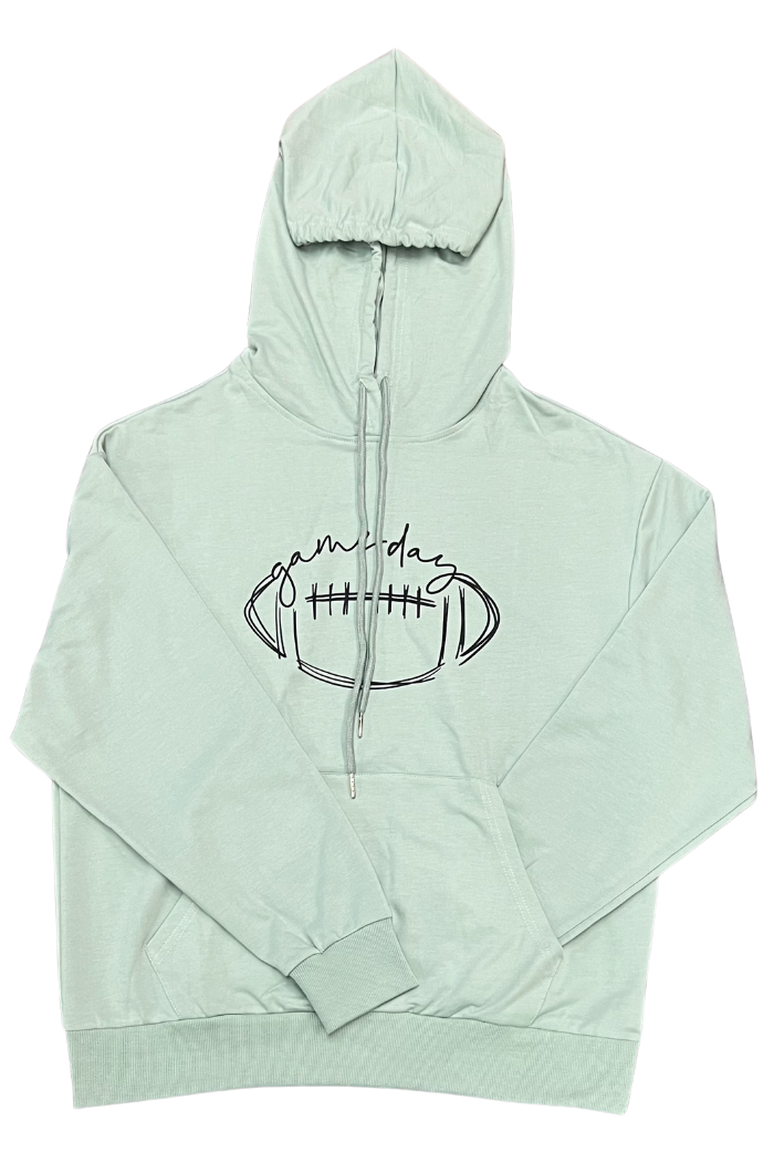 A light green hoodie with a black graphic on the front depicting a football with the words "game day" written in a script font above it. The hoodie has a hood with drawstrings and a front pouch pocket. 