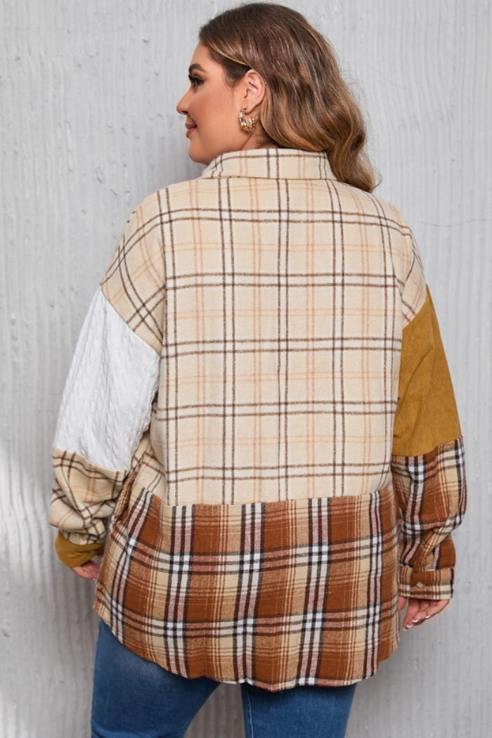 A plus-size woman, viewed from the back, wears a collared shirt jacket featuring a patchwork design of various plaid patterns and solid colors. The upper back and right sleeve are in a beige and brown plaid, while the lower back and left sleeve are in a darker brown and beige plaid. The upper part of the left sleeve is a solid white cable-knit texture, and the upper right sleeve features a solid mustard yellow or brown fabric. The woman has long, wavy brown hair and is wearing gold hoop earrings.