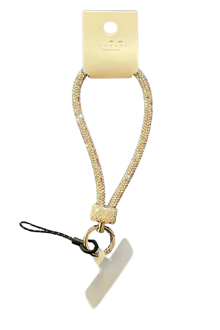A slivery, glittery wrist strap or short lanyard for a phone or keys is displayed against a white background, hanging from a small cardboard tag labeled "JEWELRY." The strap features a silver-colored split key ring and a black cord loop with a clear plastic tether tab for attaching to a phone case.