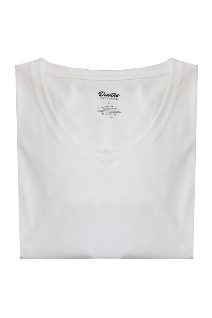 A neatly folded Cotton V-Neck Tee is displayed on a white background, highlighting its relaxed fit and visible inside label at the collar.