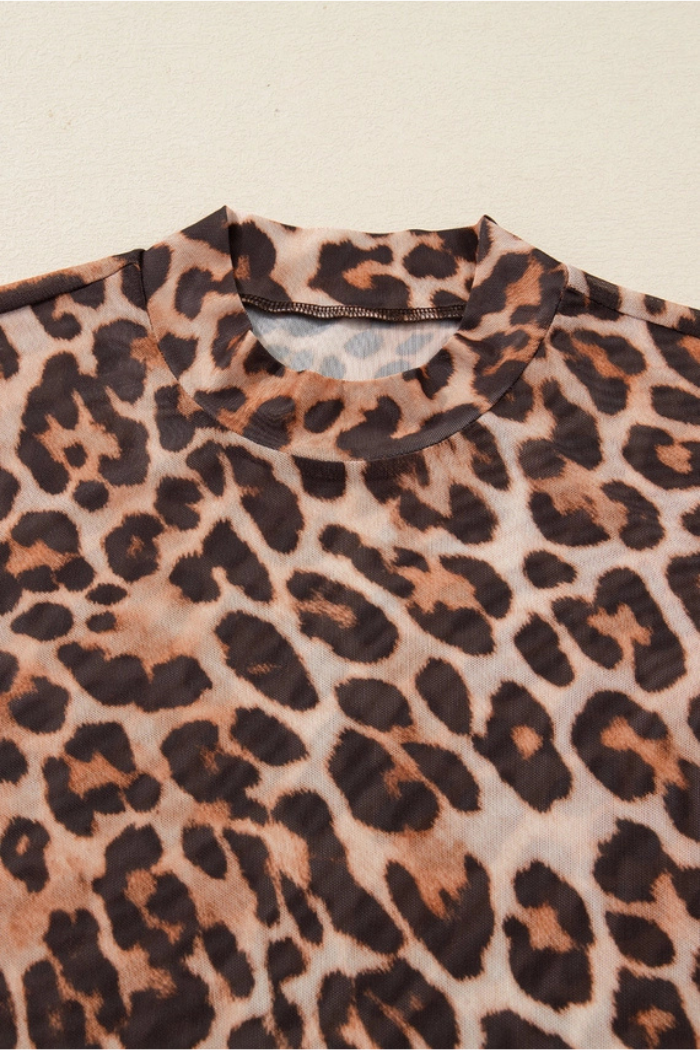 A close-up of the Leopard Mesh Mock Neck Top in brown and black, featuring a mock neckline and lightweight mesh fabric for a chic animal print style.