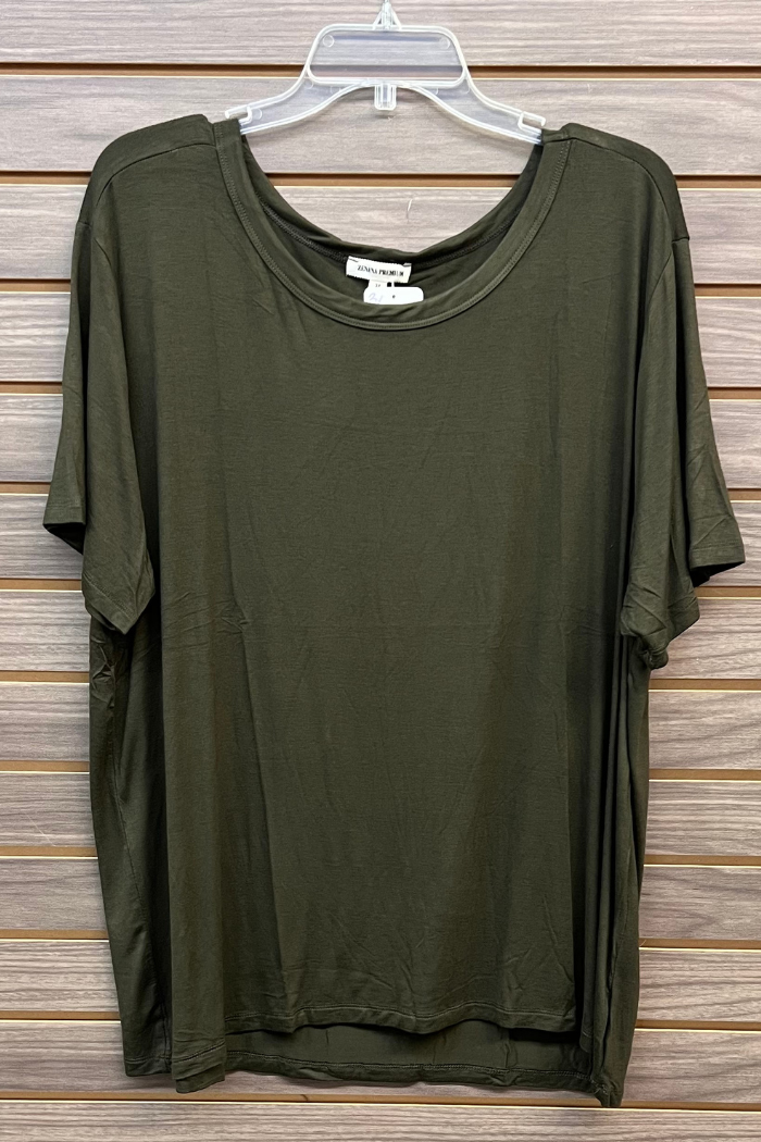 A Plus Size Rayon Tee in dark green is shown on a clear hanger against wooden slats. This Zenana Premium shirt features short sleeves, a soft rayon blend, and offers a lightweight, relaxed fit.