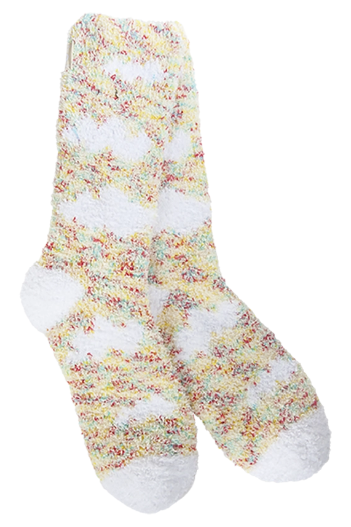 Cozy Crew Socks—a plush, fuzzy pair in white, yellow, green, and pink—displayed on a white background.