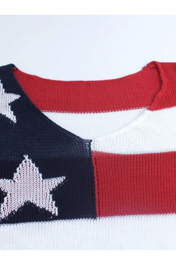 Close-up of the American Flag Knit Sweater featuring red and white stripes, a navy blue section, and white stars near the neckline—a stylish way to show your USA pride.