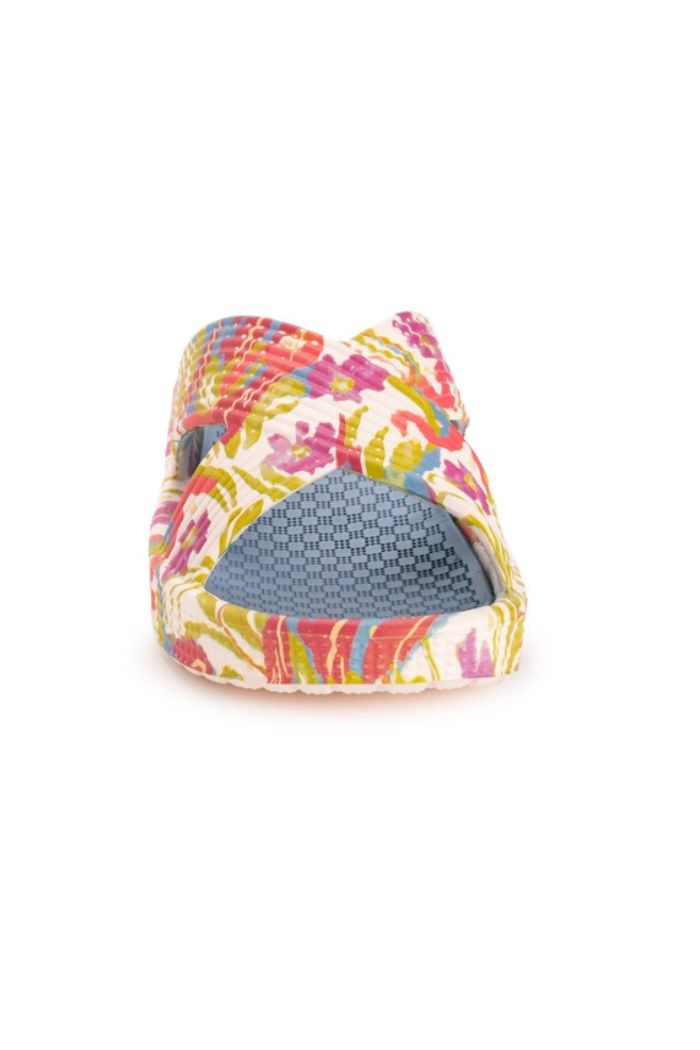 A front view of Women's Turquoise Spa Sandals with crisscross floral straps and a textured blue insole, featuring cushioned footbeds for comfort. Shown as stylish slip-on slides against a white background.