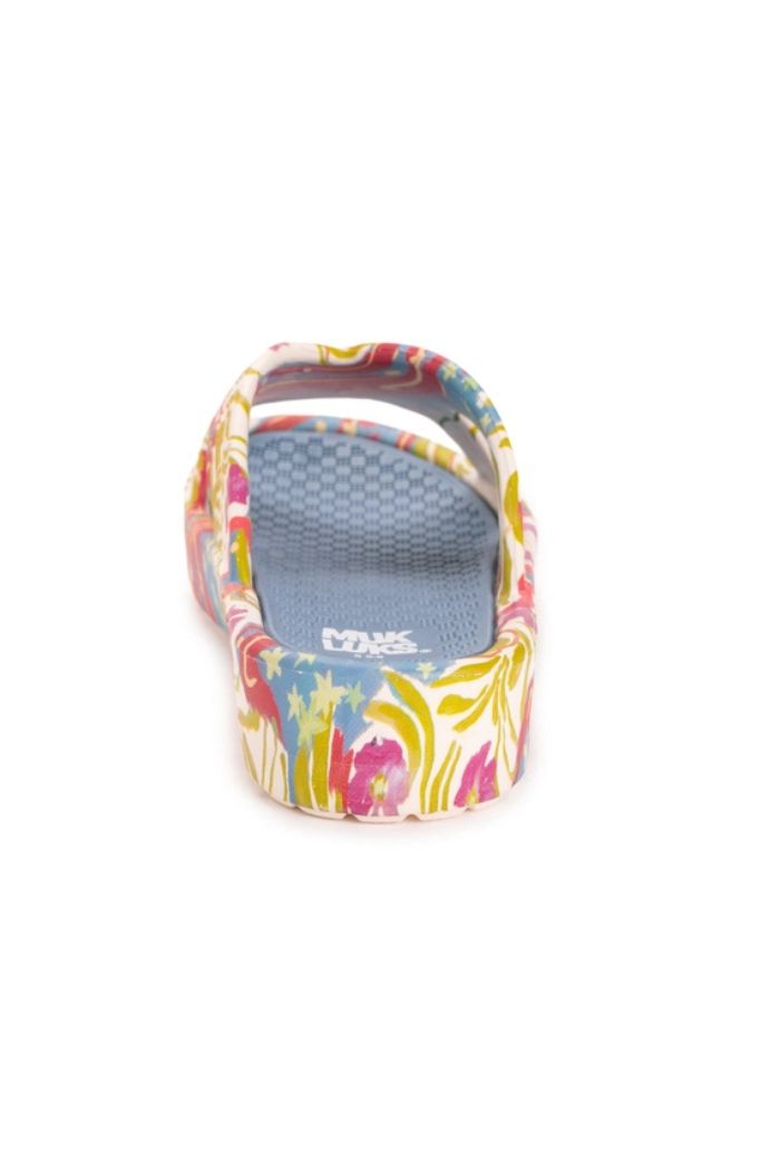 A single Women's Turquoise Spa Sandal, featuring a colorful floral pattern, cushioned footbed, and textured blue insole, is shown from the back on a white background.