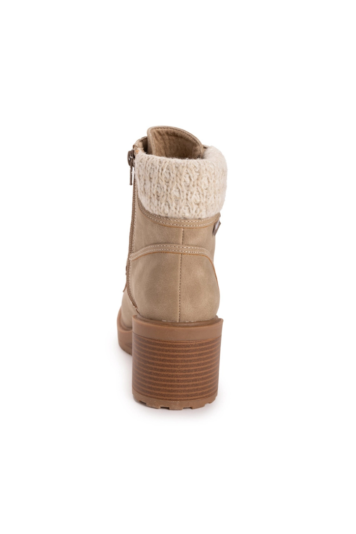 The Sky Solange Wedge Boots in tan feature a chunky wooden heel, knit cuff, and side zipper, displayed from the back against a white background.