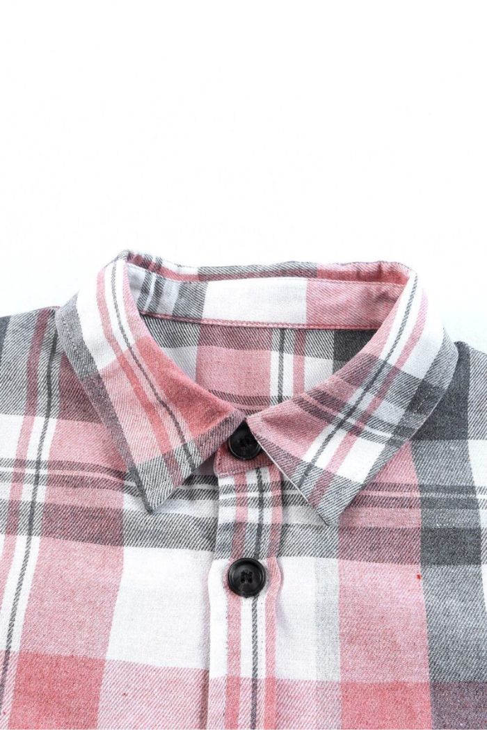 Close-up of the Plaid Button Up Shirt, showcasing its pink, white, and gray plaid pattern with a black top button.