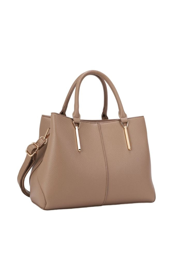 The Corina Satchel Bag is a taupe vegan leather handbag with double handles, a detachable shoulder strap, and gold-tone hardware, shown against a white background.
