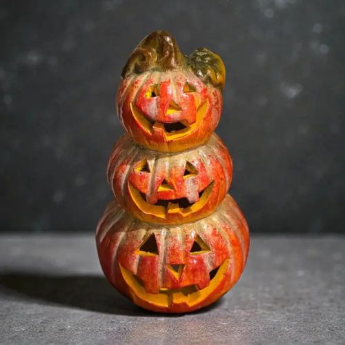 The LED Jack-O’-Lantern Stack features three smiling pumpkins arranged vertically, making it a charming Halloween accent perfect for any seasonal display.