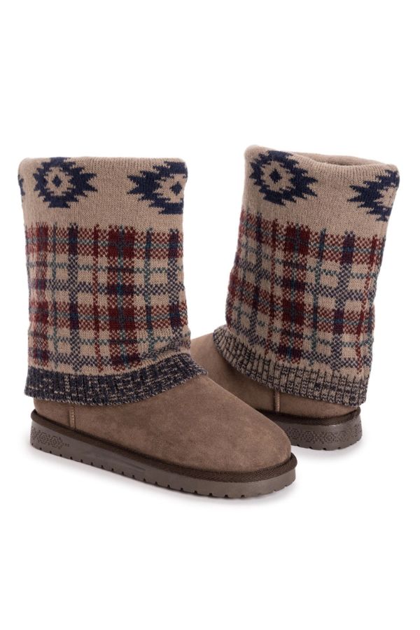 MUK LUKS Cheryl Aztec Plaid mid-calf boots featuring brown suede-like feet and patterned knit shafts with Aztec and plaid designs.
