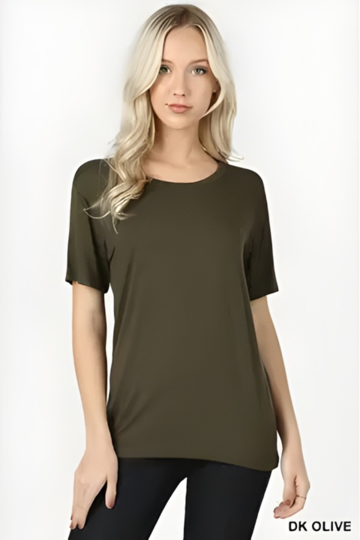 Woman wearing a dark olive green t-shirt on a white background