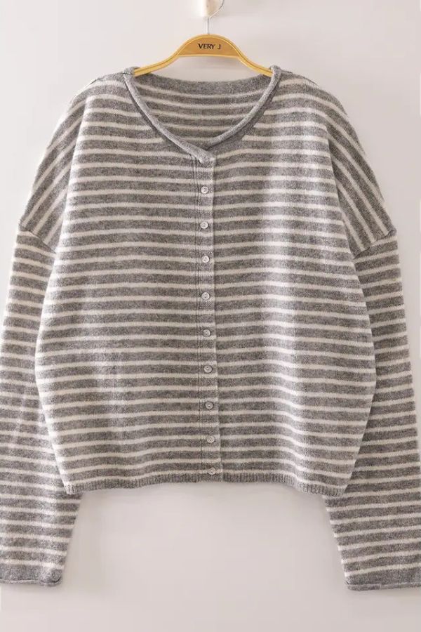 Striped Button Front Sweater featuring gray and white stripes, long sleeves, and a button-up design. Displayed on a hanger against a light background, this cozy knit piece adds effortless style and comfort to your wardrobe, making it perfect for layering in any season.