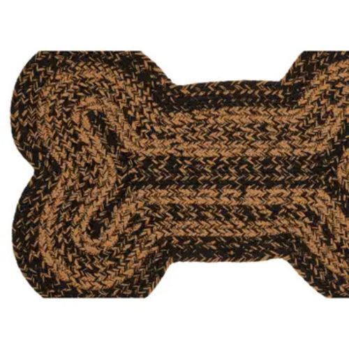 The Braided Bone Shaped Rug features a durable braided construction with brown and black fibers, creating a stylish bone-shaped rug designed for lasting use.