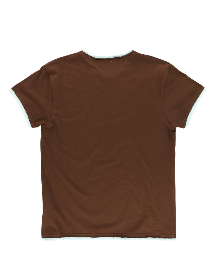 The Dog Mom, Cat Nap & More Pajama Tops feature a plain brown short-sleeve design with light trim on the collar and sleeves, crafted from soft cotton for all-day comfort. Shown laid flat from the back.