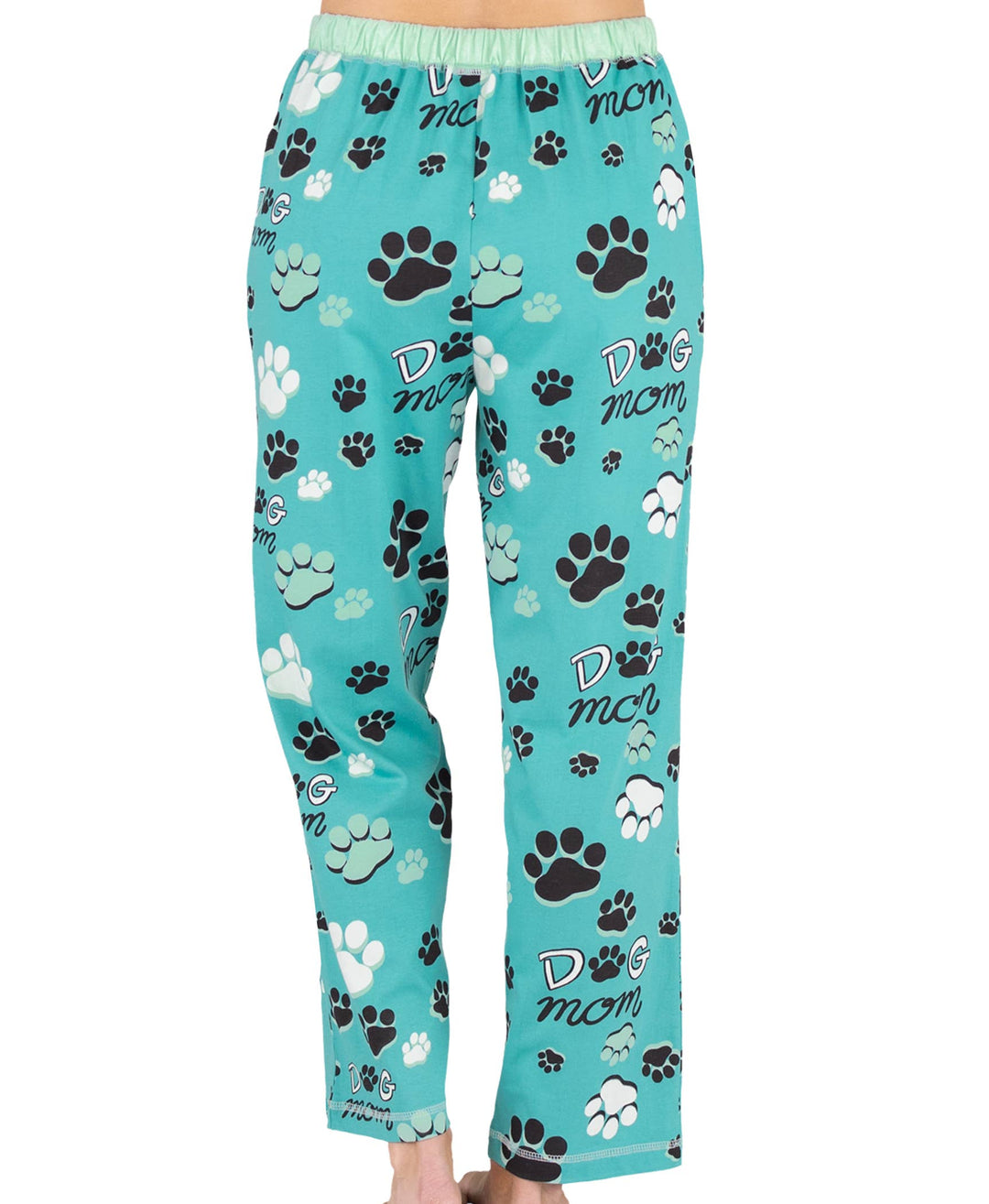 Wearing the Dog Mom, Cat Nap & More Pajama Pants, decorated with novelty paw prints and "DOG mom" text, this person pairs the cozy teal cotton lounge pants with bare feet for a relaxed look.