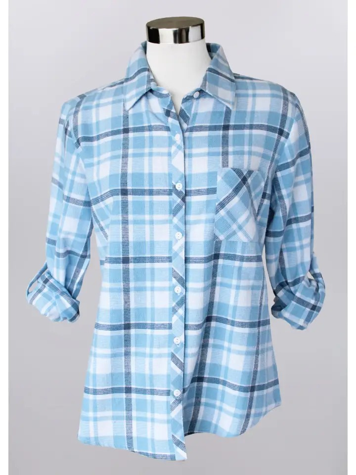 The Plaid Button Shirt is a women’s long-sleeve button-up in light blue and white plaid, featuring a front chest pocket and crafted from soft cotton, shown on a mannequin against a plain background.