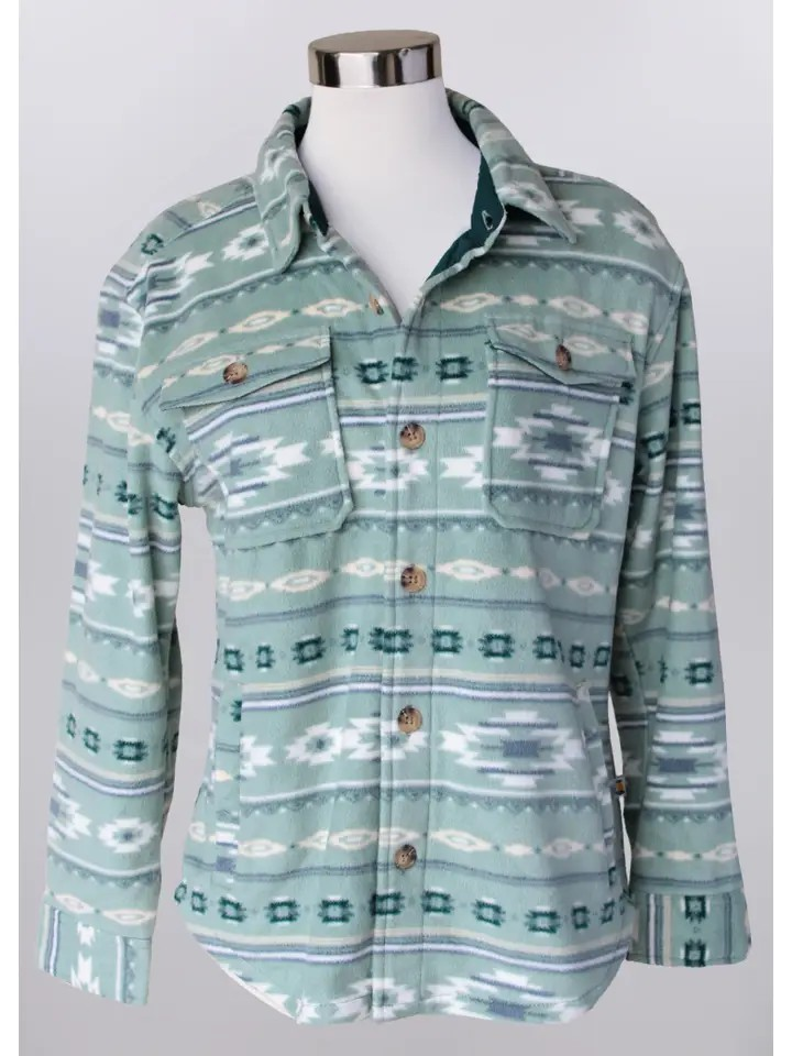 A mannequin displays the Southwestern Fleece Shacket—a long-sleeve, button-up shirt with a green and white geometric Southwestern pattern and two chest pockets—against a plain background.